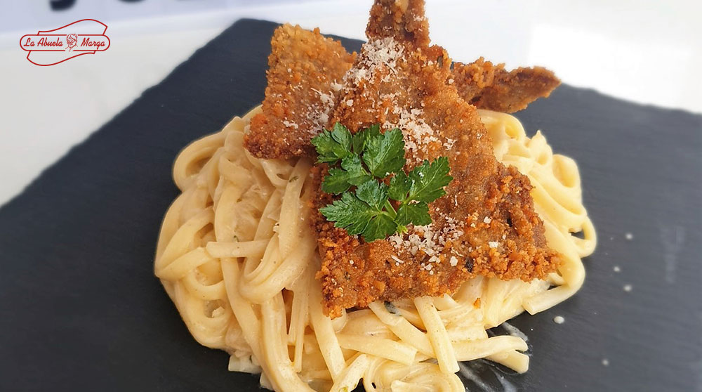 Receta de carne: Fetuccini con milanesa de ternera