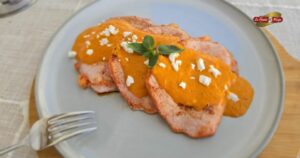 Receta lomo adobado con salsa de piquillo.